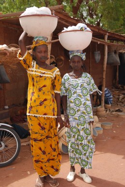 Peul ladies carrying milk, Mopti, Mali